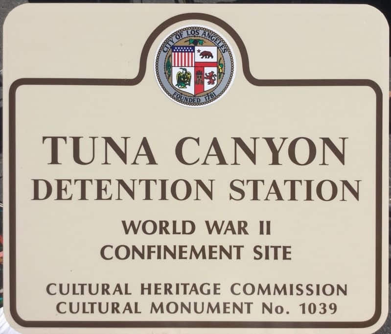 The City of Los Angeles historic-cultural monument marker at the Tuna Canyon Detention Station site, labeled 'Tuna Canyon Detention Station — World War II Confinement Site — Cultural Heritage Commission Cultural Monument No. 1039.'